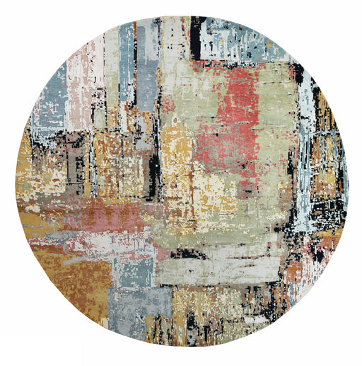 A round wool and silk area rug with geometric patterns in gold and green colors.