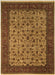 An ornate traditional area rug with a central field of beige and brown floral motifs, surrounded by a dark red and green patterned border.